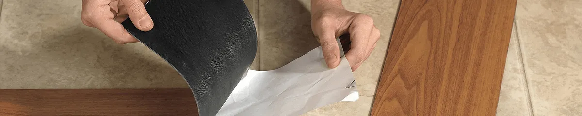 A professional installing vinyl flooring in Anaheim, CA